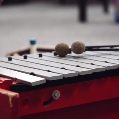 A picture of a red glockenspiel used for music therapy